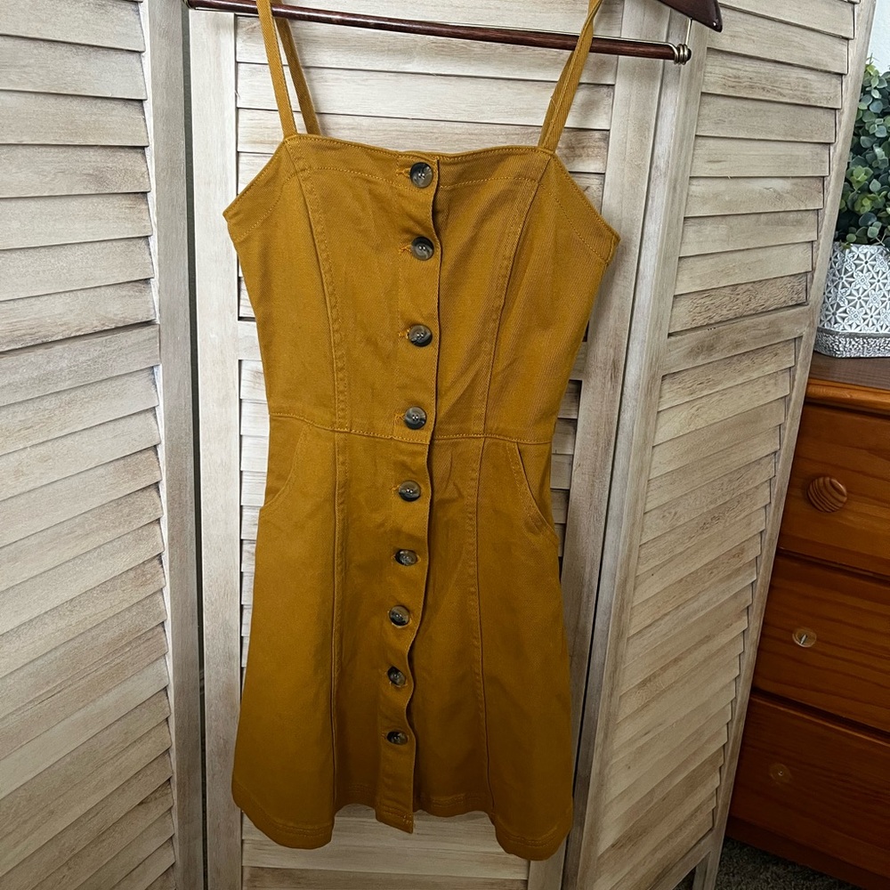 Yellow denim dress.